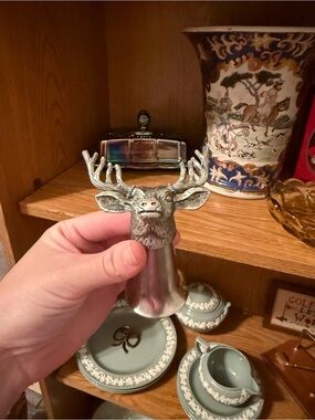Jäegermeister shot glass featuring a detailed pewter deer